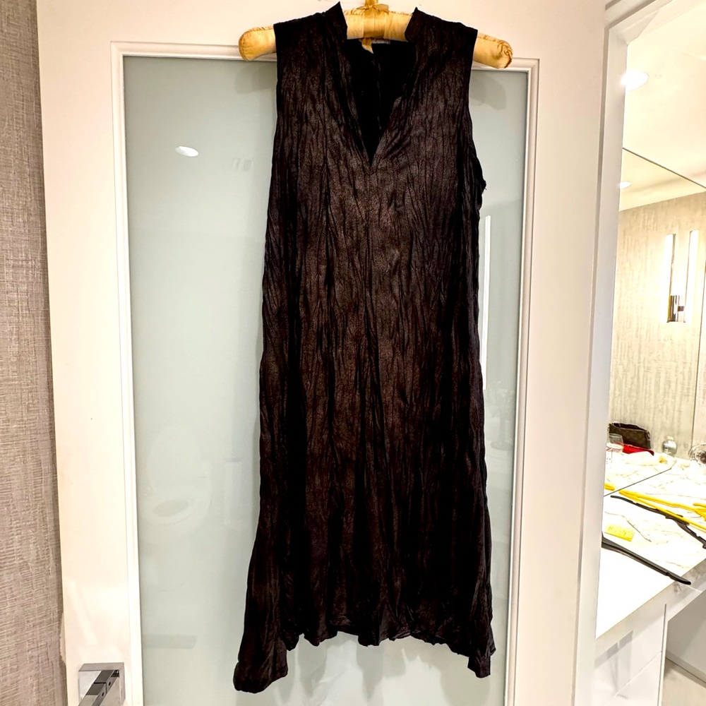 Deep charcoal gray loose fitting dress.